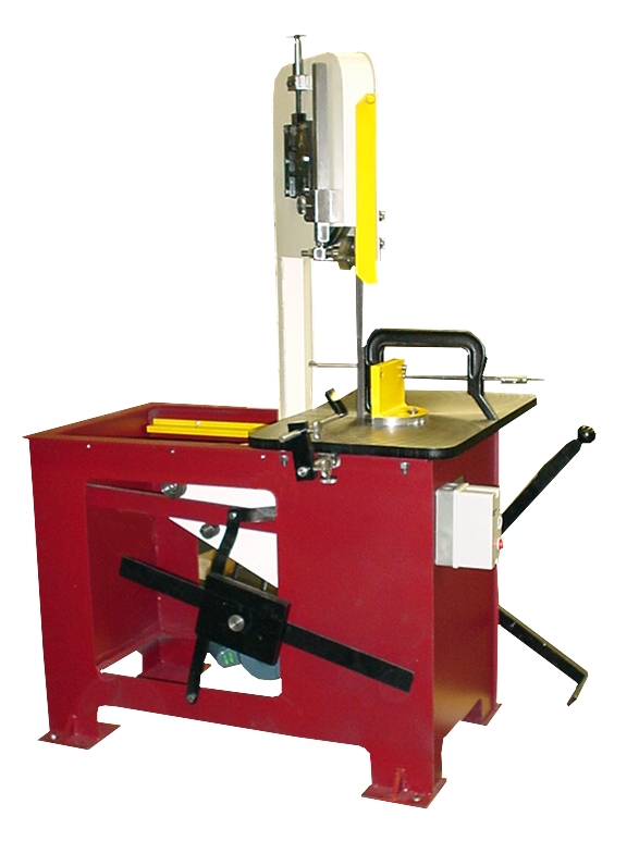 A red machine with a yellow handle and a black table